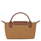 Longchamp Le Pliage Original pouch with handle, soft nylon bag featuring a compact design and shoulder strap for versatile use.