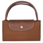 Longchamp Le Pliage Original S handbag in beige with top handles and foldable design, showcasing its compact, stylish bag features.