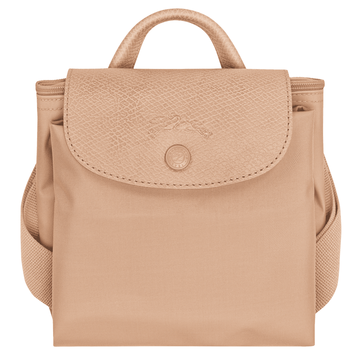 Longchamp Le Pliage One M backpack showing its beige nylon exterior with leather handles and compact, foldable design.