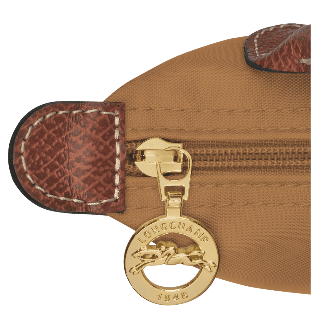 Longchamp Le Pliage Original pouch with handle, lightweight bag in beige with zipper closure and leather accents.
